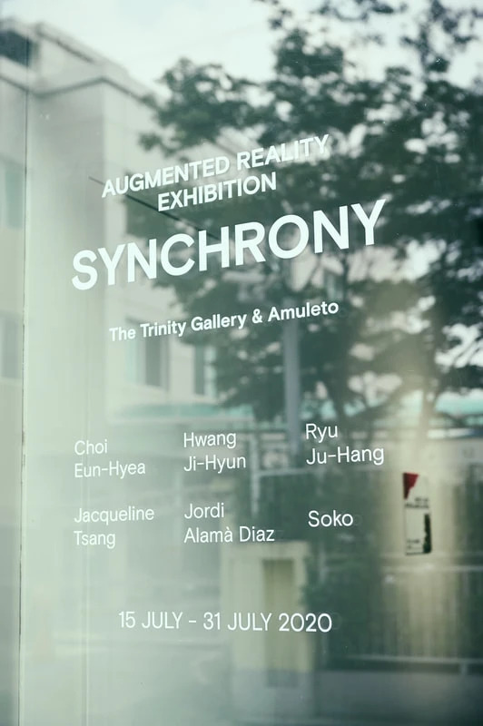 Synchrony exhibit details on the gallery window